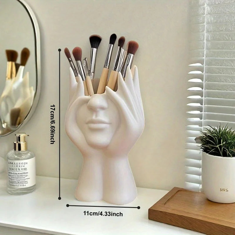 A modern white cosmetic organizer box with a hand-shaped design and heart-shaped cutout - an elegant and minimalist cosmetic