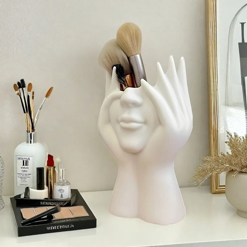 A modern white cosmetic organizer box with a hand-shaped design and heart-shaped cutout - an elegant and minimalist cosmetic