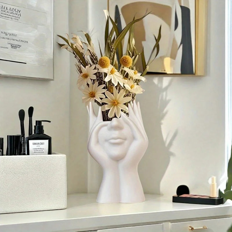 A modern white cosmetic organizer box with a hand-shaped design and heart-shaped cutout - an elegant and minimalist cosmetic