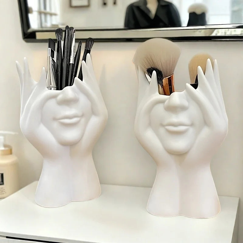 A modern white cosmetic organizer box with a hand-shaped design and heart-shaped cutout - an elegant and minimalist cosmetic